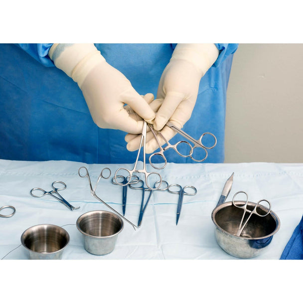 Gloved hands handling reusable surgical dental instruments on sterile tray, GN SURGICAL LTD