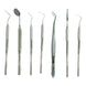 Set of seven stainless steel dental surgical instruments with textured handles from GN SURGICAL LTD